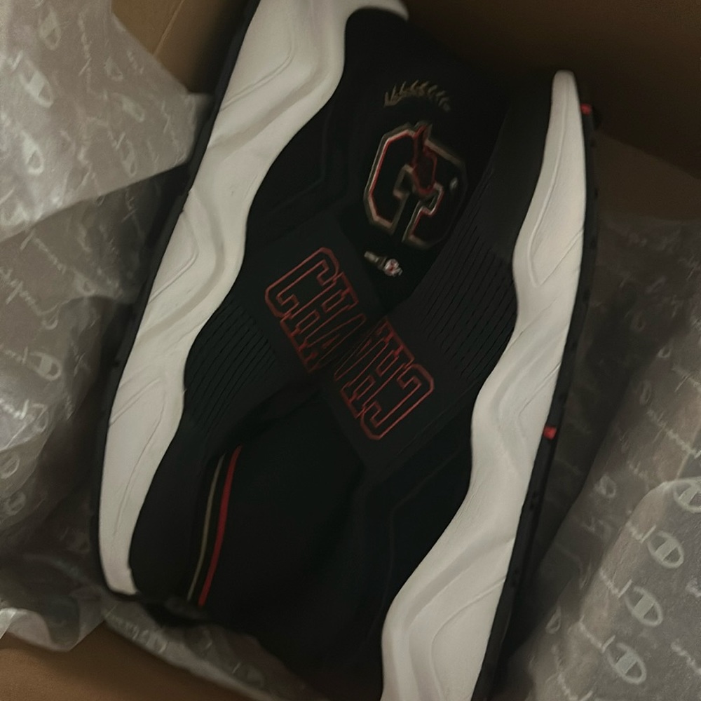 Brand new size 12 Champion slip on sneakers. Very comfortable. Still in box